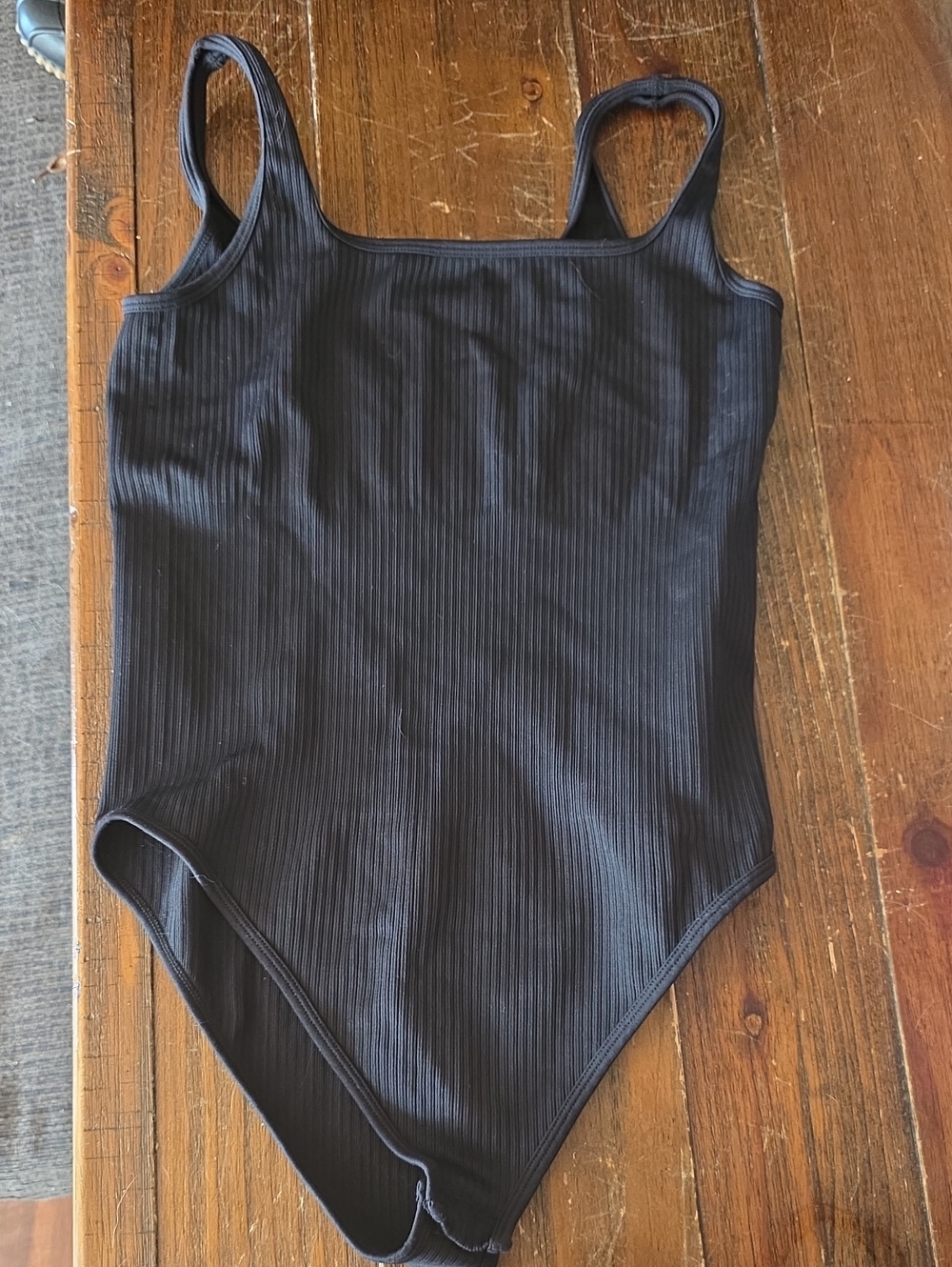 Woman's black OQQ tank top bodysuit size Large. NWOT